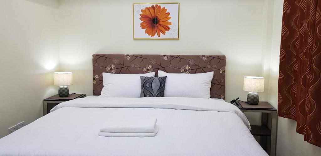 Postel nebo postele na pokoji v ubytování Cess Summer Boutique Hotel