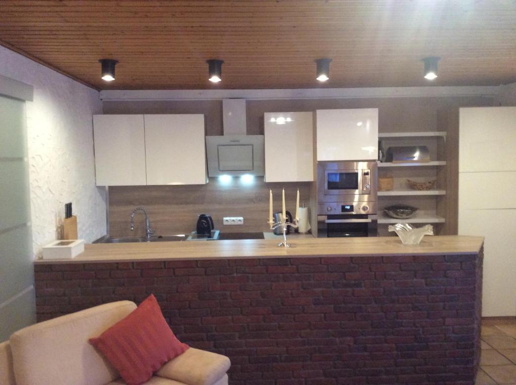 Kuchyň nebo kuchyňský kout v ubytování Ferienwohnung Höhenweg 25