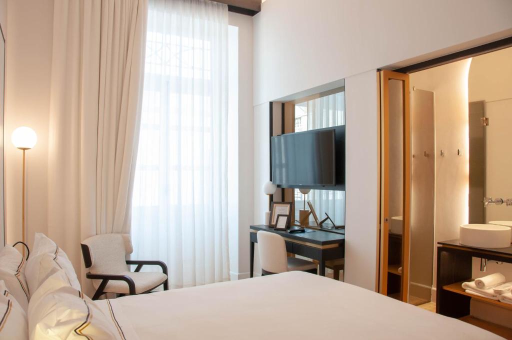 TV a/nebo společenská místnost v ubytování S Paul City Hotel