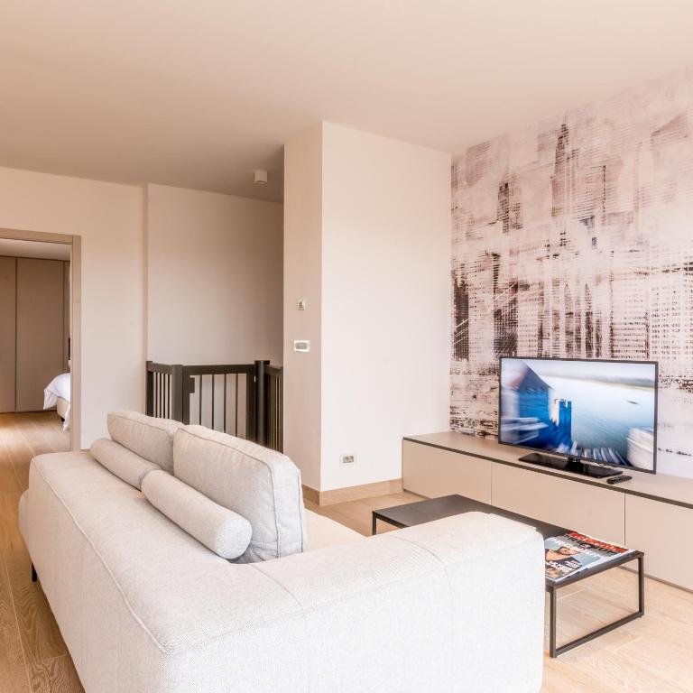 TV a/nebo společenská místnost v ubytování The Residence Gare
