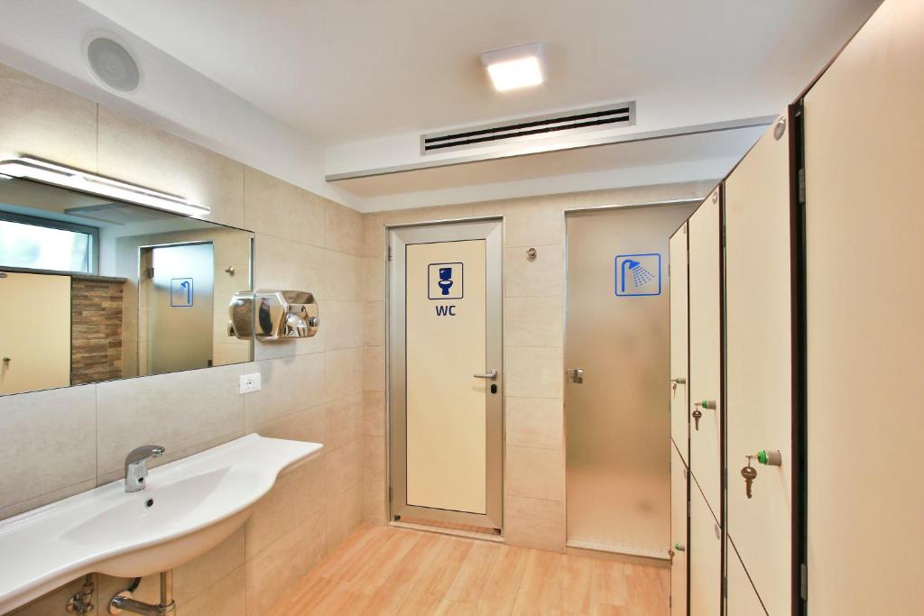 Koupelna v ubytování Hotel Meridianus