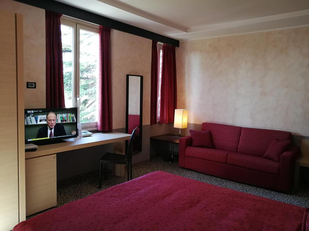 Postel nebo postele na pokoji v ubytování Domus Park Hotel & SPA