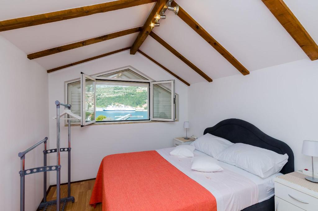 Posteľ alebo postele v izbe v ubytovaní Apartment Marina View