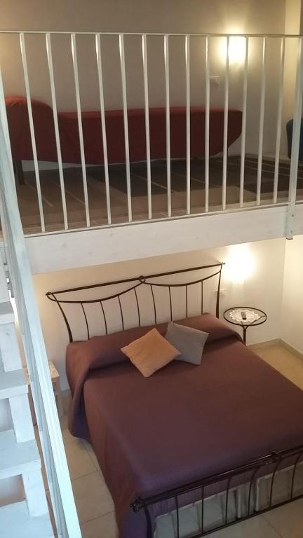 Postel nebo postele na pokoji v ubytování Pietra Bianca