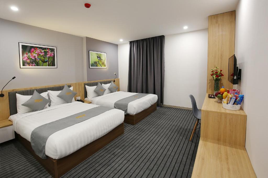 Postel nebo postele na pokoji v ubytování Davue Hotel by THG