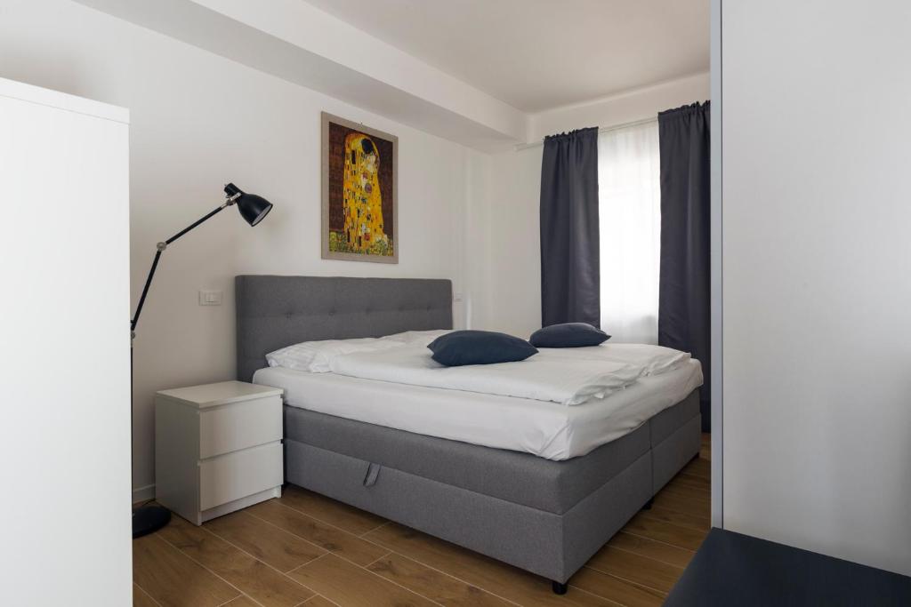 Posteľ alebo postele v izbe v ubytovaní Albergo Diffuso ELA Living - Design Apartment & Room