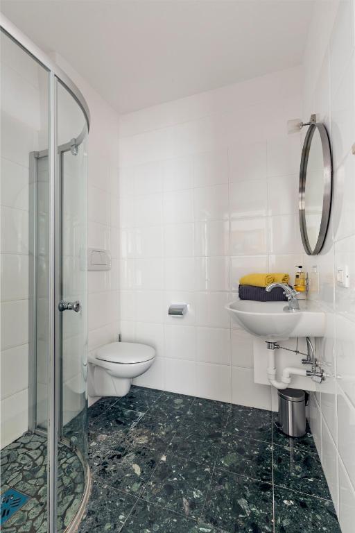 Kúpeľňa v ubytovaní Albergo Diffuso ELA Living - Design Apartment & Room