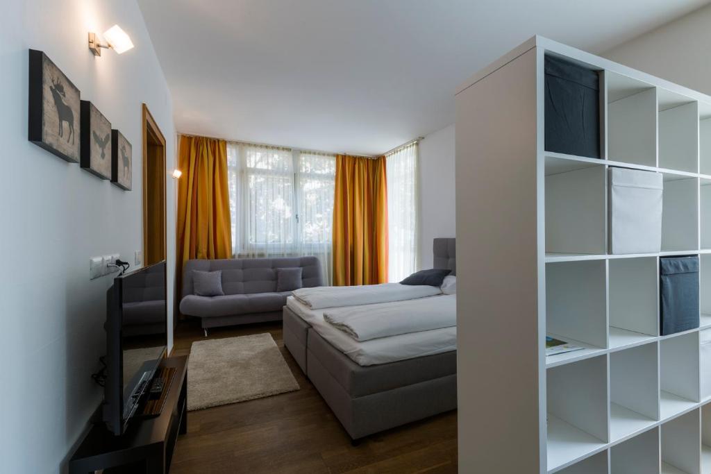 Posteľ alebo postele v izbe v ubytovaní Albergo Diffuso ELA Living - Design Apartment & Room