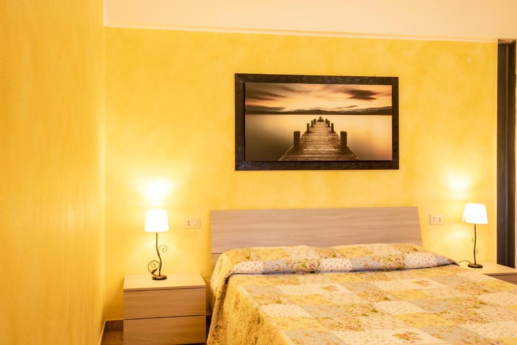 Postel nebo postele na pokoji v ubytování Agriturismo Jesson Rosamund