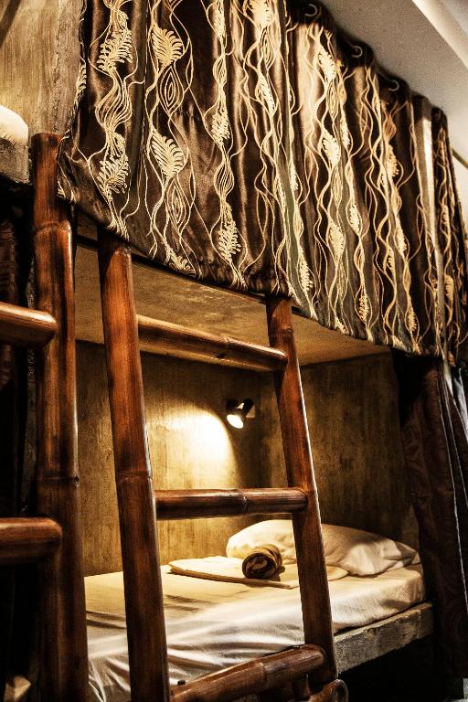 Postel nebo postele na pokoji v ubytování Sunlit Hostel