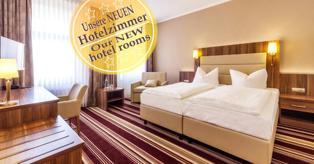 Postel nebo postele na pokoji v ubytování Hotel Burgas