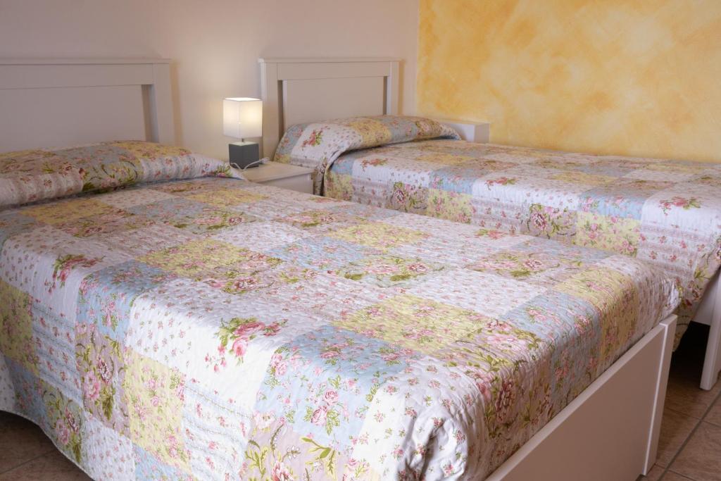 Postel nebo postele na pokoji v ubytování Agriturismo Jesson Rosamund
