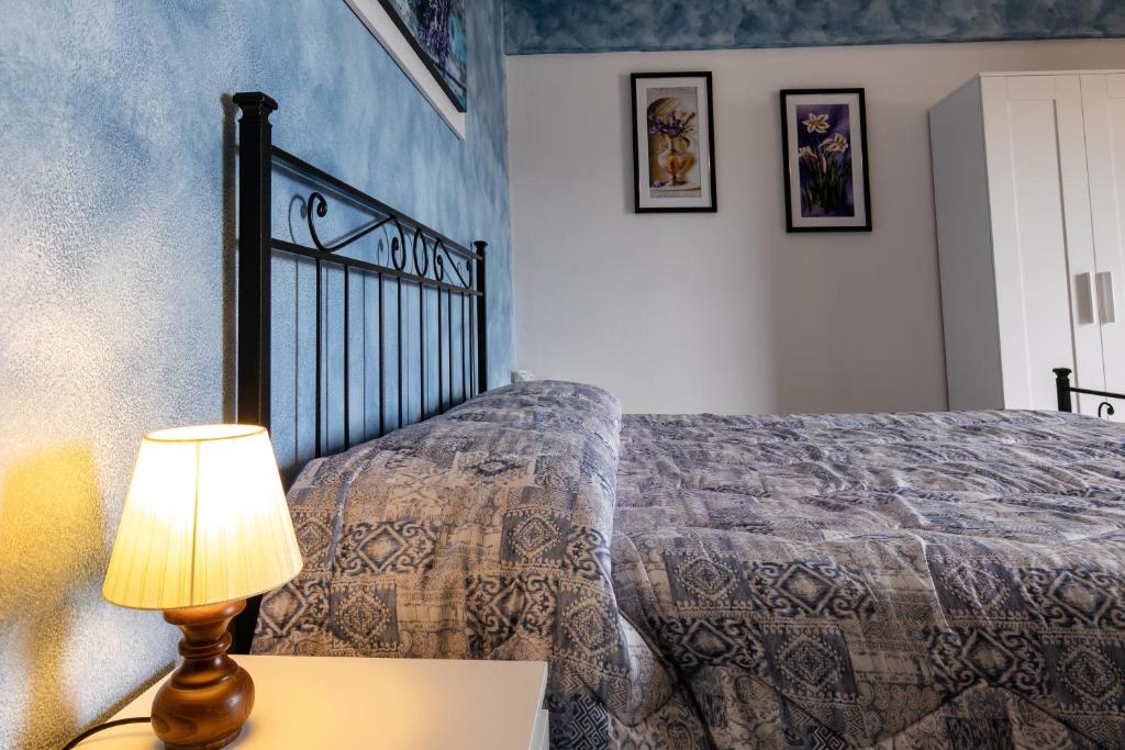 Postel nebo postele na pokoji v ubytování Agriturismo Jesson Rosamund
