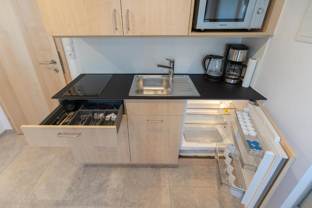 Kuchyň nebo kuchyňský kout v ubytování Ferienwohnung Metzler - Blick auf die Berge
