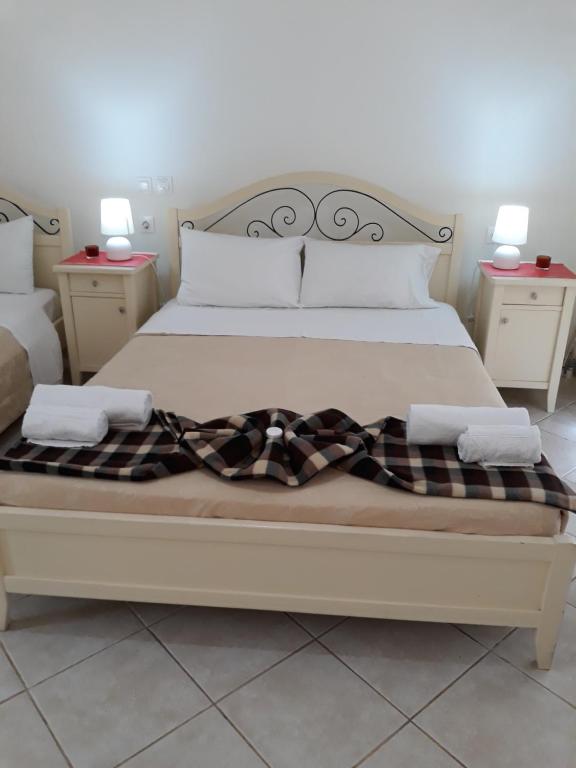 Postel nebo postele na pokoji v ubytování PULADES RESORT