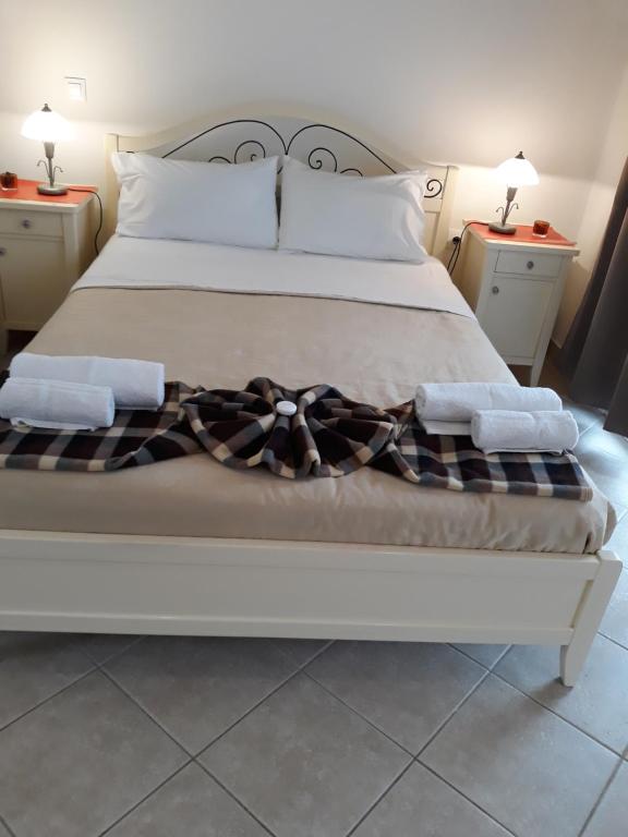 Postel nebo postele na pokoji v ubytování PULADES RESORT