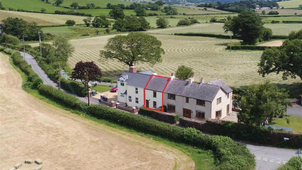 an aerial view of a house in the middle of a field at Ty Doli Cottage, rural location just outside Conwy town in Llangelynin