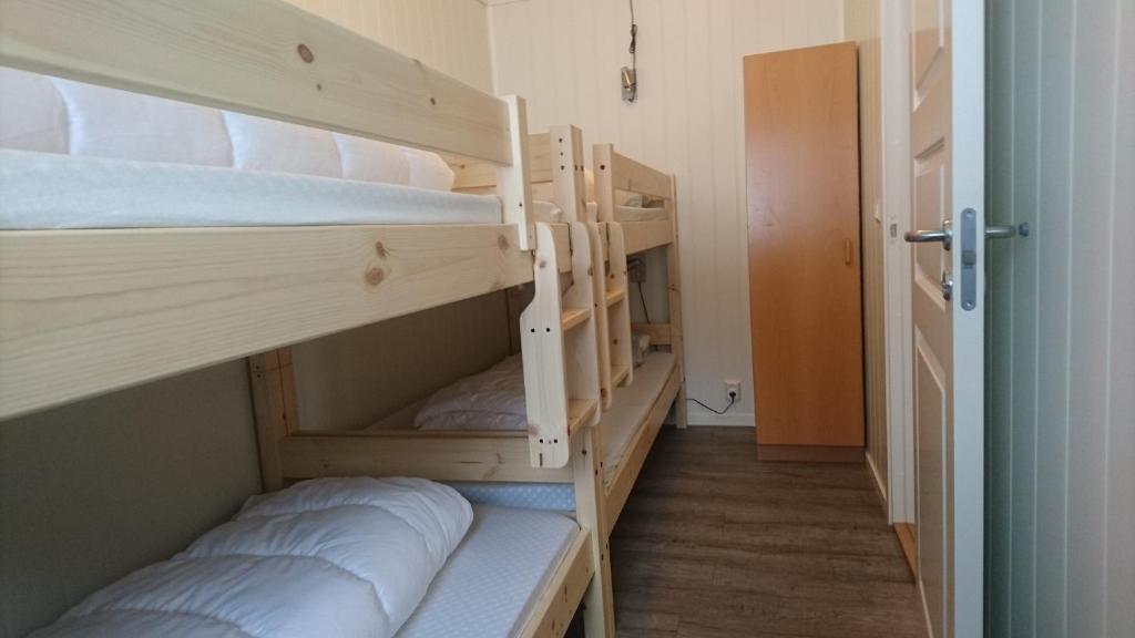 Postel nebo postele na pokoji v ubytování IMI Stølen