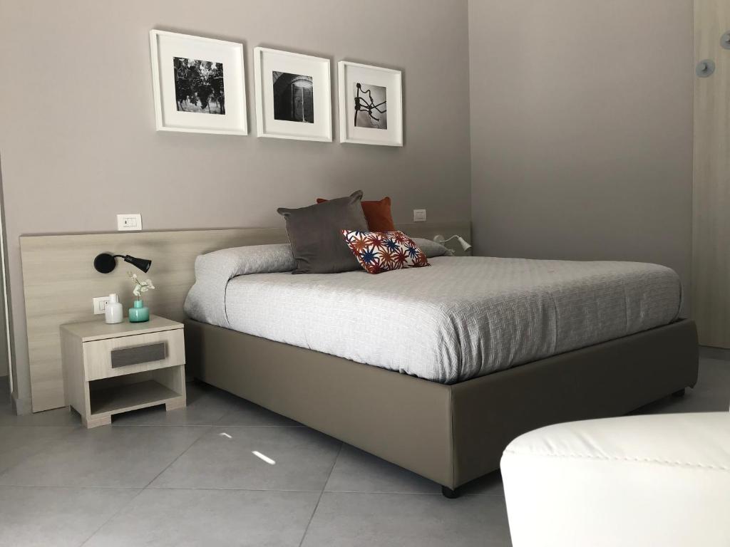 Postel nebo postele na pokoji v ubytování La Corte di Arianna
