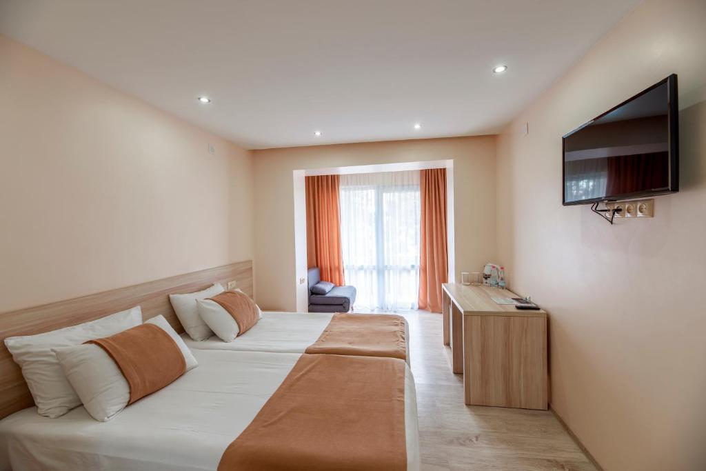 TV a/nebo společenská místnost v ubytování Kolkhida Resort & Spa