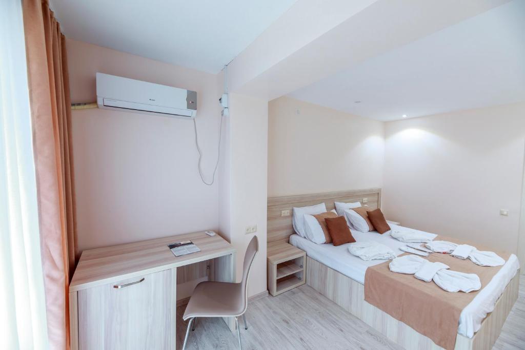 Ліжко або ліжка в номері Kolkhida Resort & Spa
