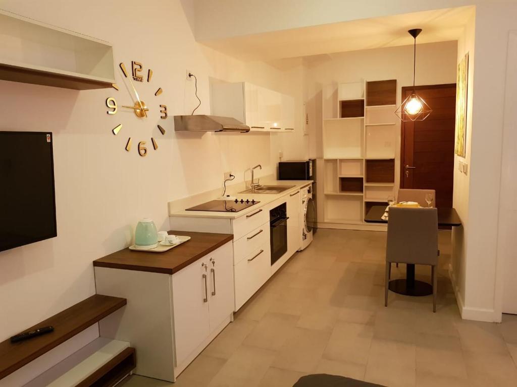 Kuchyň nebo kuchyňský kout v ubytování Studio 103, Ebene Square