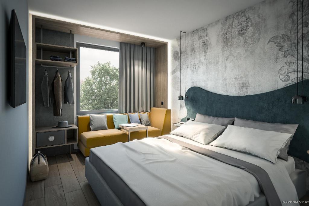 Posteľ alebo postele v izbe v ubytovaní Hotel Rainers21
