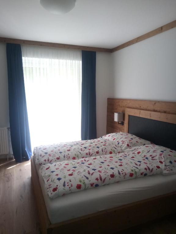 A bed or beds in a room at Ferienhaus Mendlingbauer
