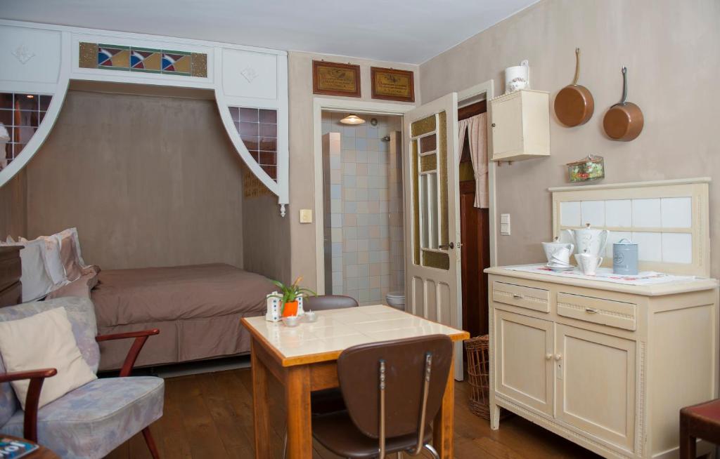 Kuchyň nebo kuchyňský kout v ubytování B&B Tspijker