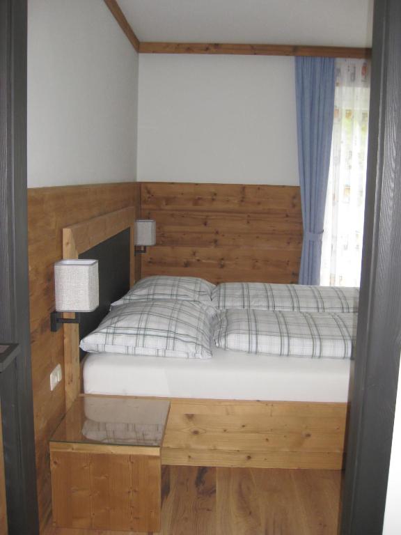 A bed or beds in a room at Ferienhaus Mendlingbauer