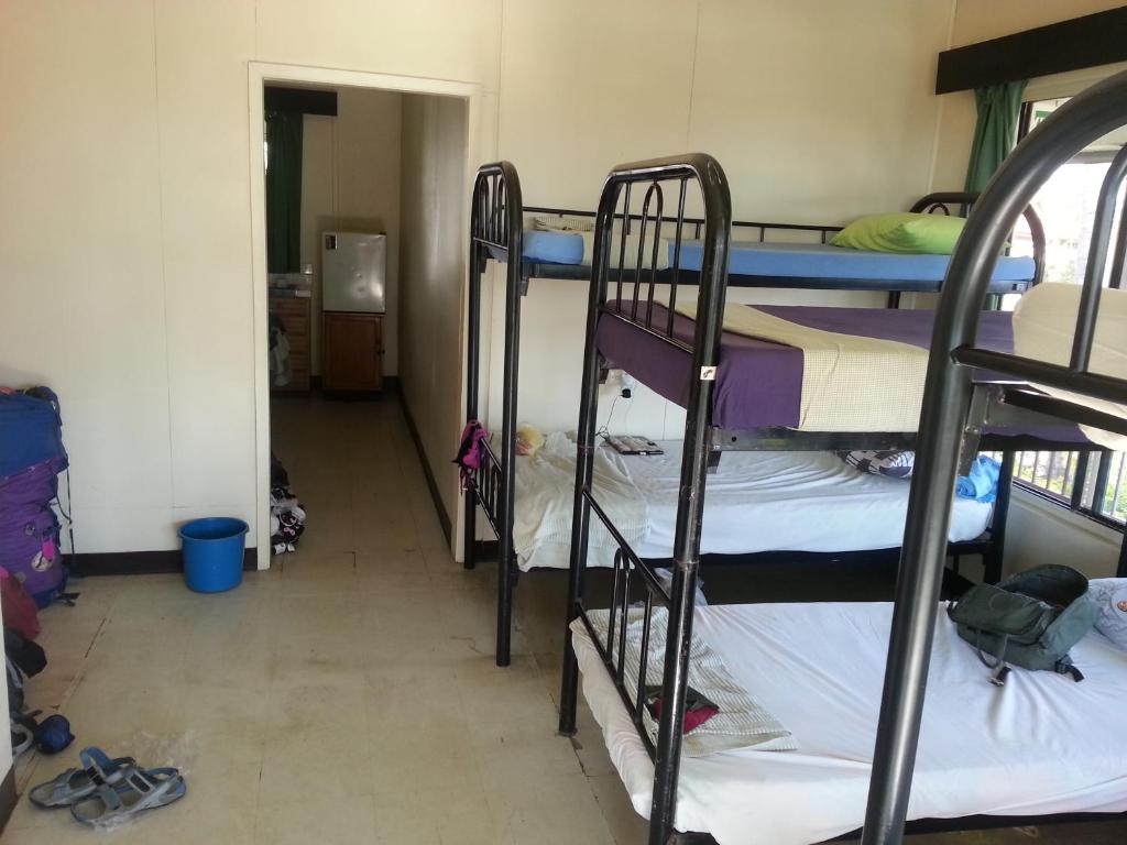 Postel nebo postele na pokoji v ubytování Bamboo Backpackers