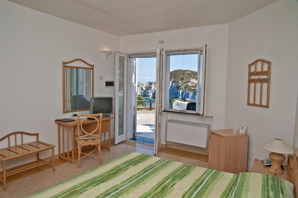 TV a/nebo společenská místnost v ubytování Hotel Villaggio Dei Pescatori