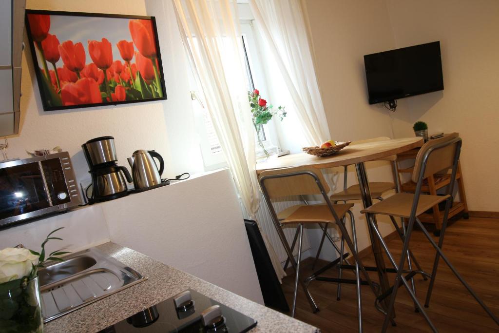 Kuchyň nebo kuchyňský kout v ubytování Apart Hotel Paradies