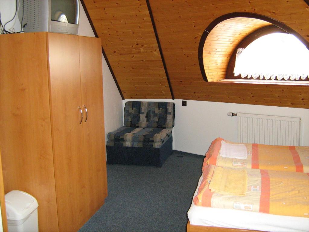Postel nebo postele na pokoji v ubytování Penzion Albína - Restaurace
