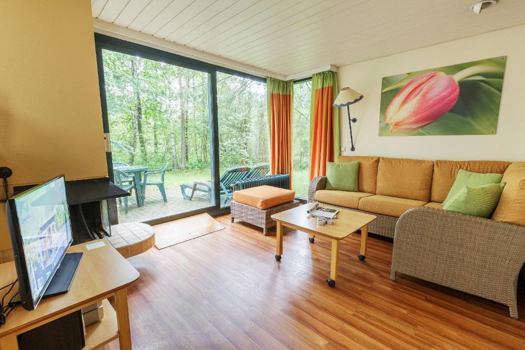 TV a/nebo společenská místnost v ubytování Center Parcs Bispinger Lüneburger Heide