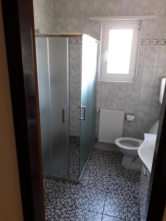 Koupelna v ubytování Apartments Filip