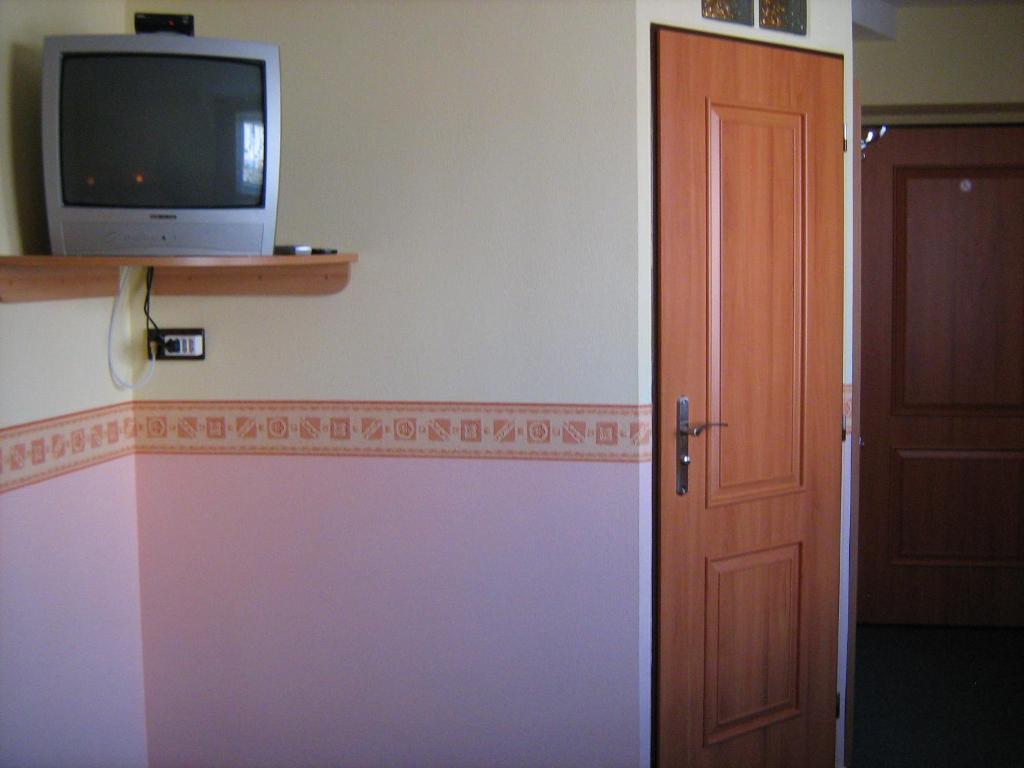 TV a/nebo společenská místnost v ubytování Penzion Albína - Restaurace