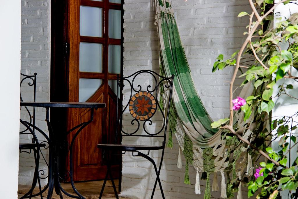 Uma varanda ou terraço em Pousada Villa Caju