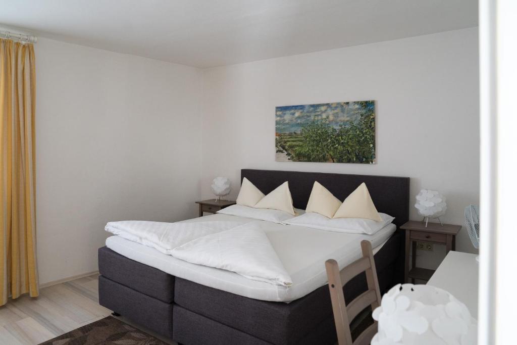 Postel nebo postele na pokoji v ubytování Hotel Johannes-Zeche
