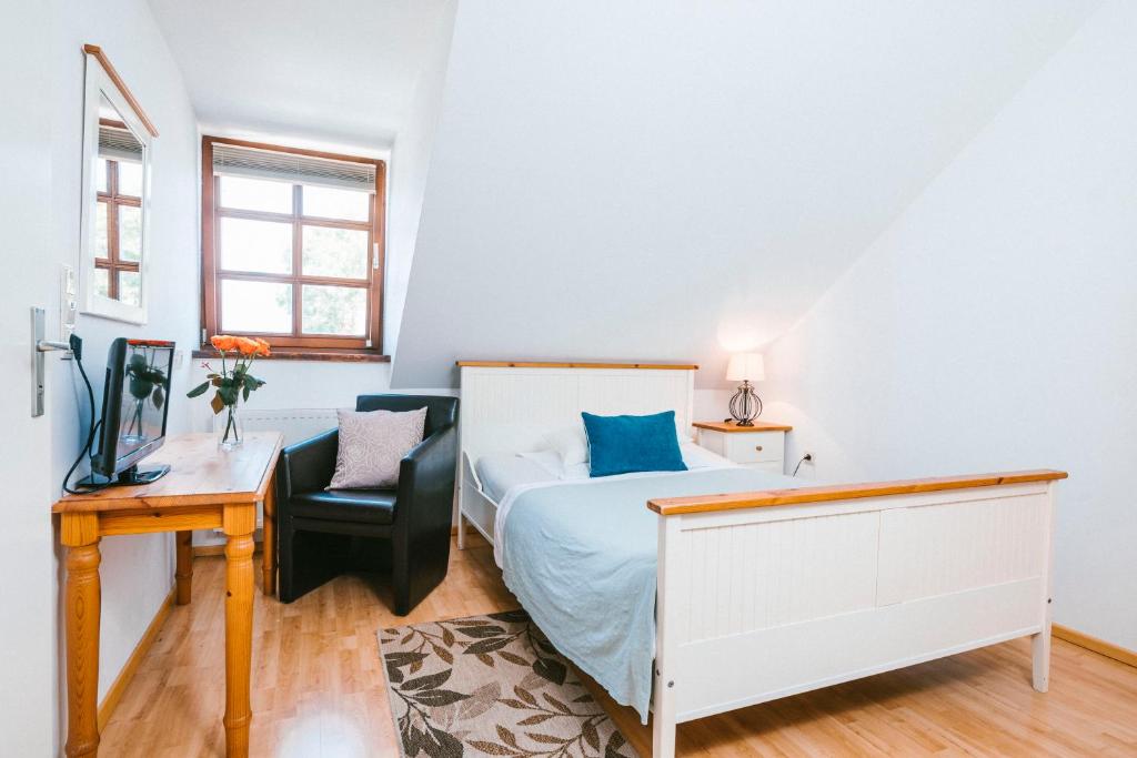 Postel nebo postele na pokoji v ubytování Hotel Johannes-Zeche