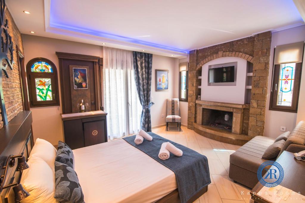 TV a/nebo společenská místnost v ubytování Kappa Rooms Boutique Hotel
