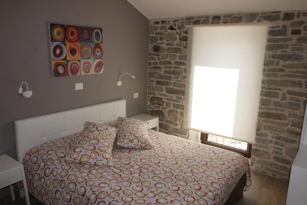 Ein Bett oder Betten in einem Zimmer der Unterkunft Mirutt Home