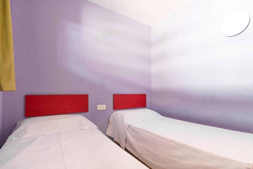 Posteľ alebo postele v izbe v ubytovaní Sistach Rentals Apartaments Sol 304 & 404