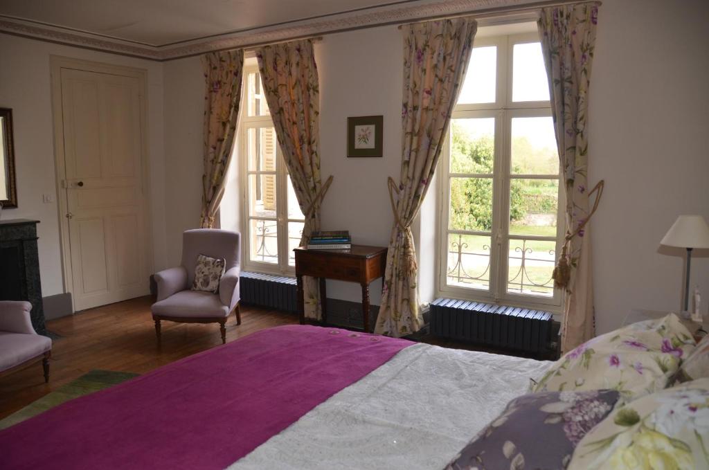 Postel nebo postele na pokoji v ubytování Chateau Igny