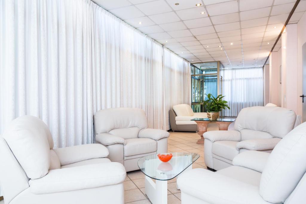 Posezení v ubytování Hotel Ambasciatori