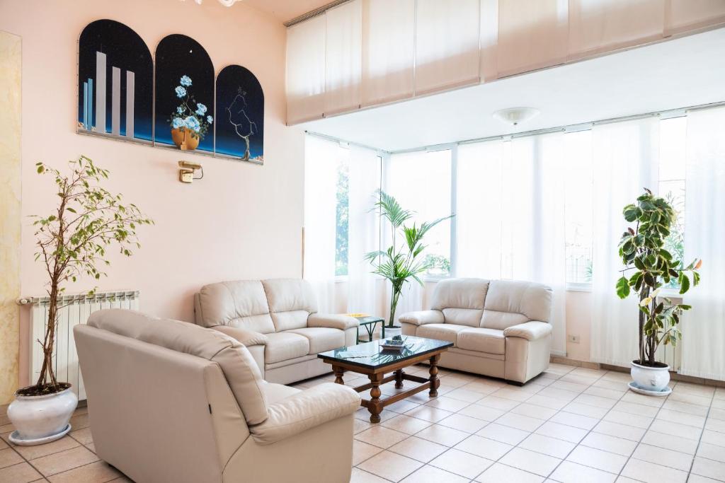 Posezení v ubytování Hotel Ambasciatori