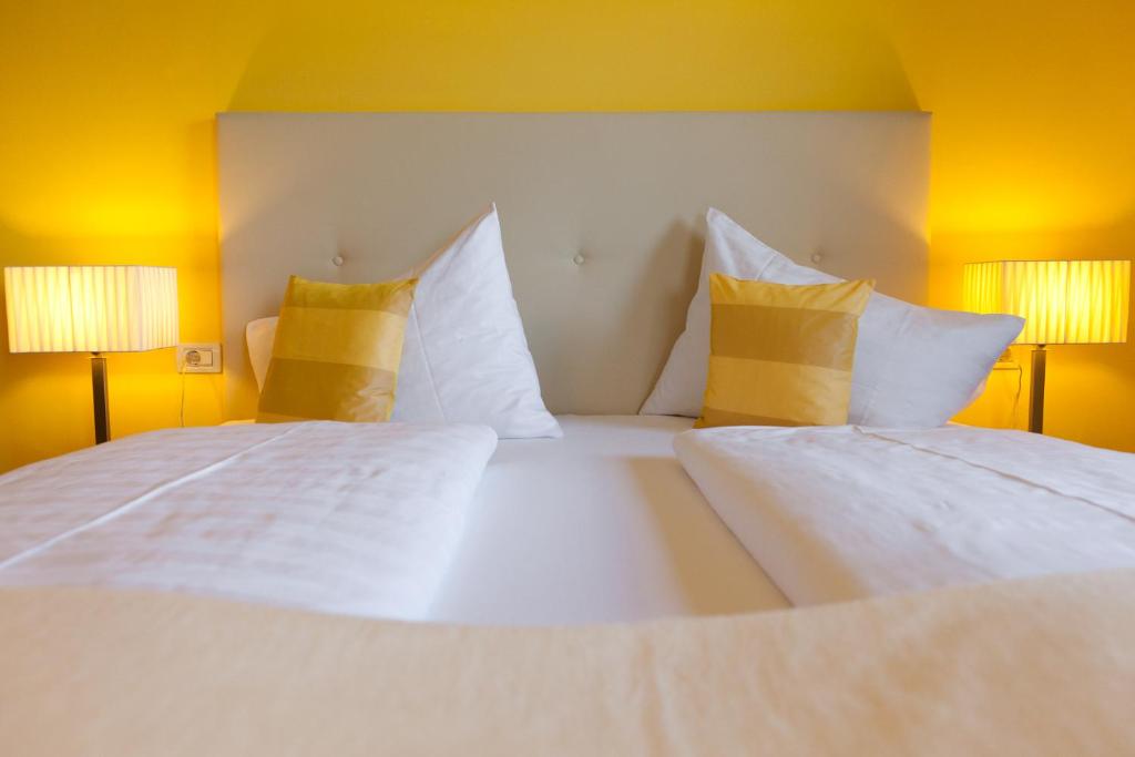 Postel nebo postele na pokoji v ubytování Hotel & Appartement Valtnaungut