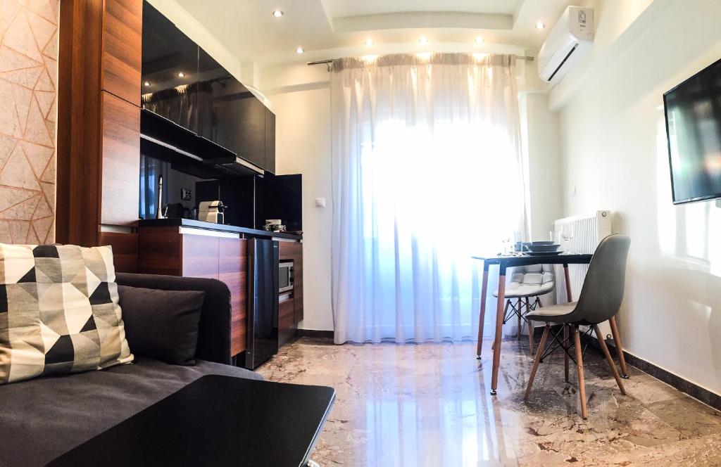 Televízia a/alebo spoločenská miestnosť v ubytovaní EPaN Luxury Apartments