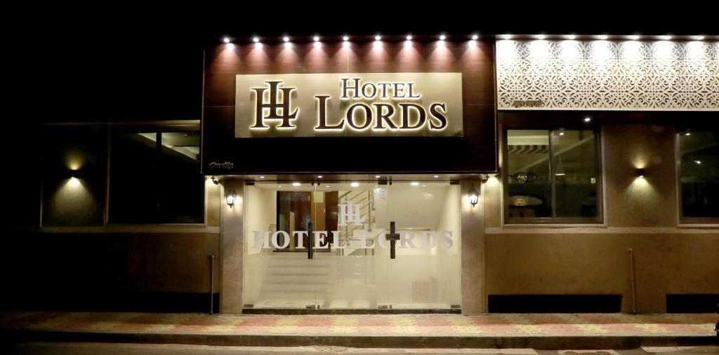 a store front with a sign for the hotel lords at Hotel Lords, Fort in Mumbai