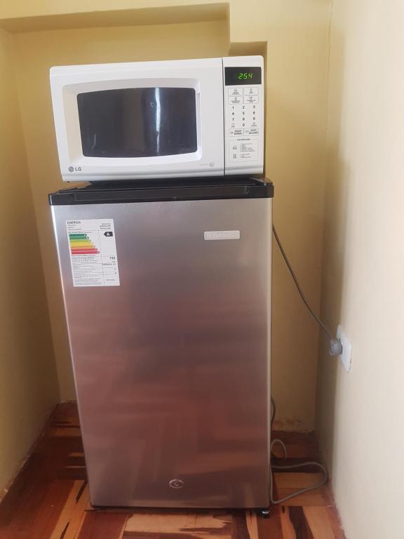 Kuchyň nebo kuchyňský kout v ubytování Hostal Wasichay